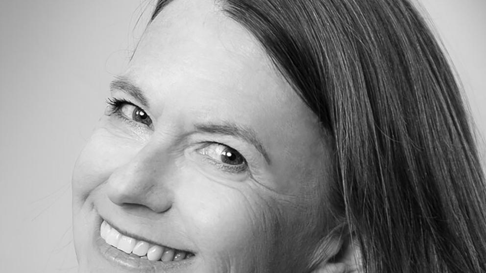 woman smiling at a camera
